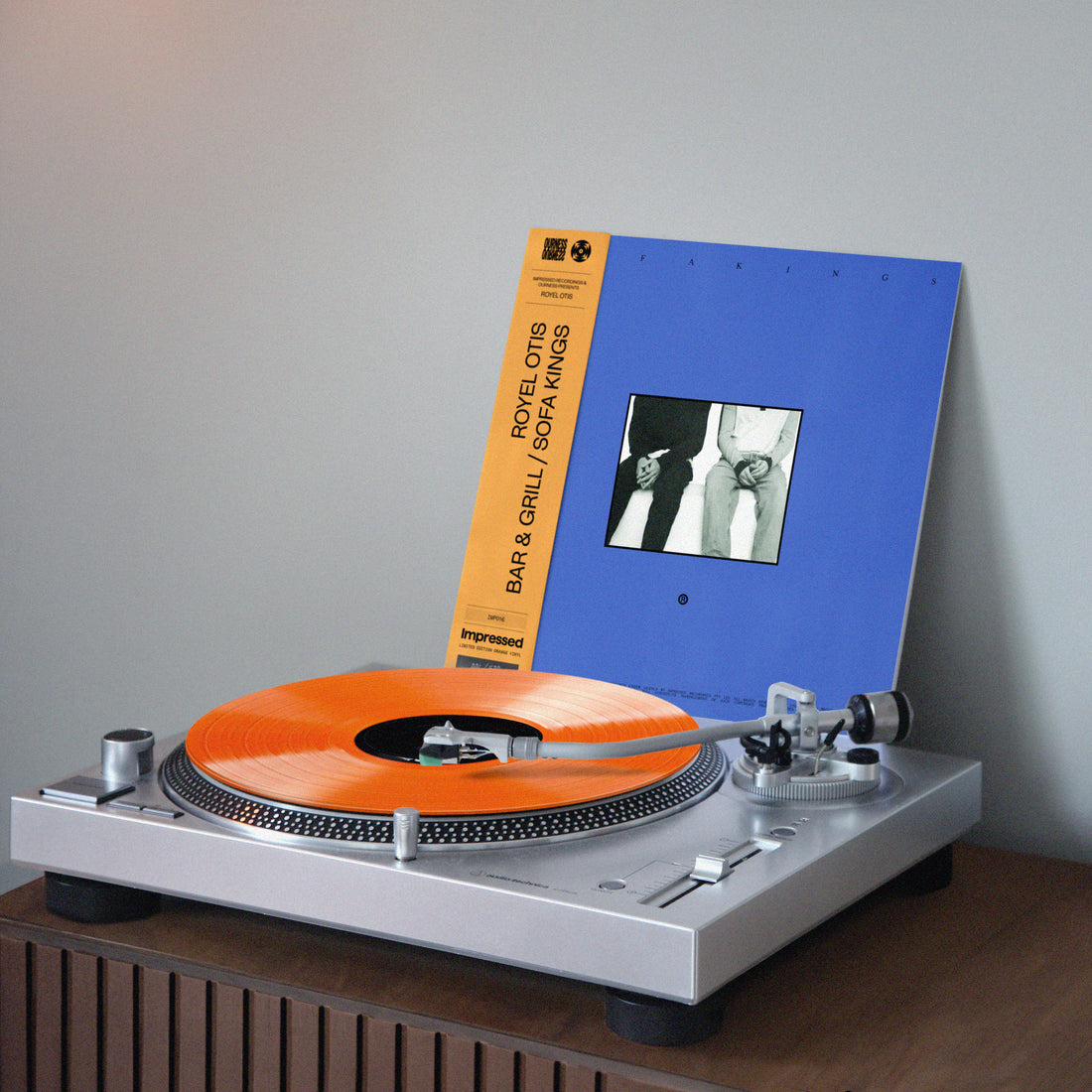 Orange vinyl on turntable